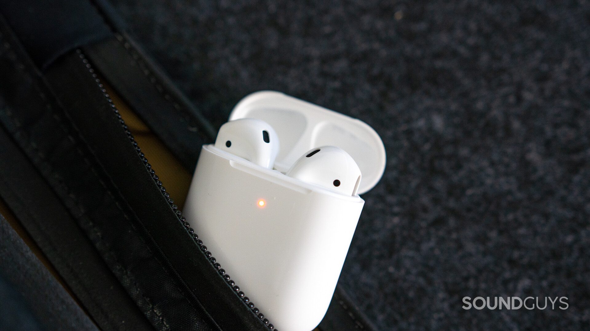 Airpods 2-3 The Apple AirPods (2nd generation) case with the 'buds inside.