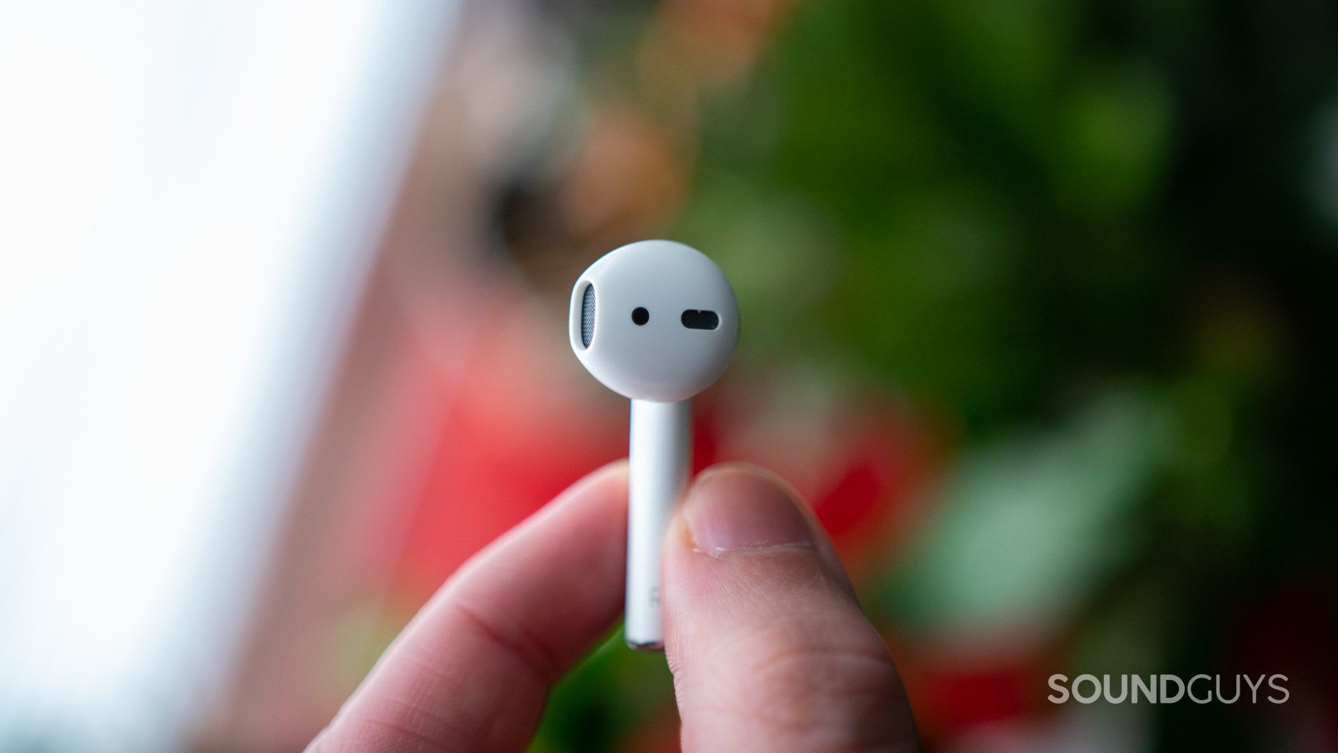 Airpods 2-5 A single earphone of the Apple AirPods (2nd generation).