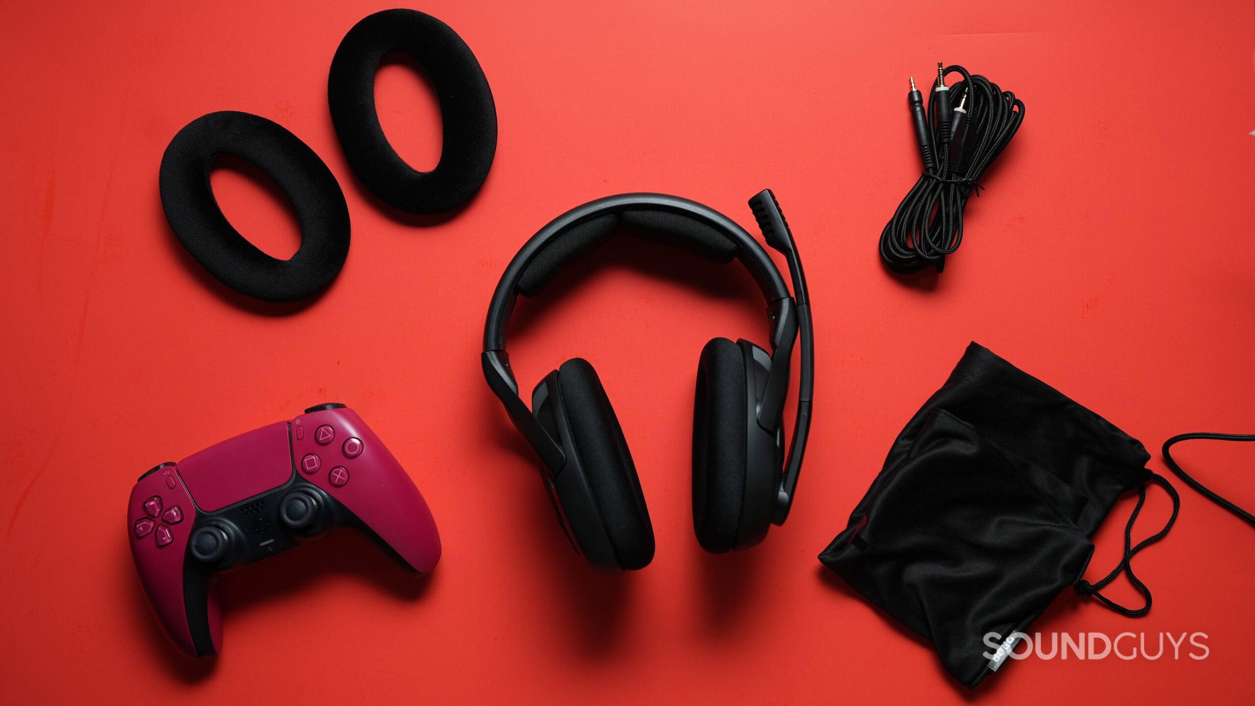 Drop + Sennheiser EPOS PC38X Drop + Sennheiser EPOS PC38X with earpads, cable, carrying pouch, and PS5 controller.