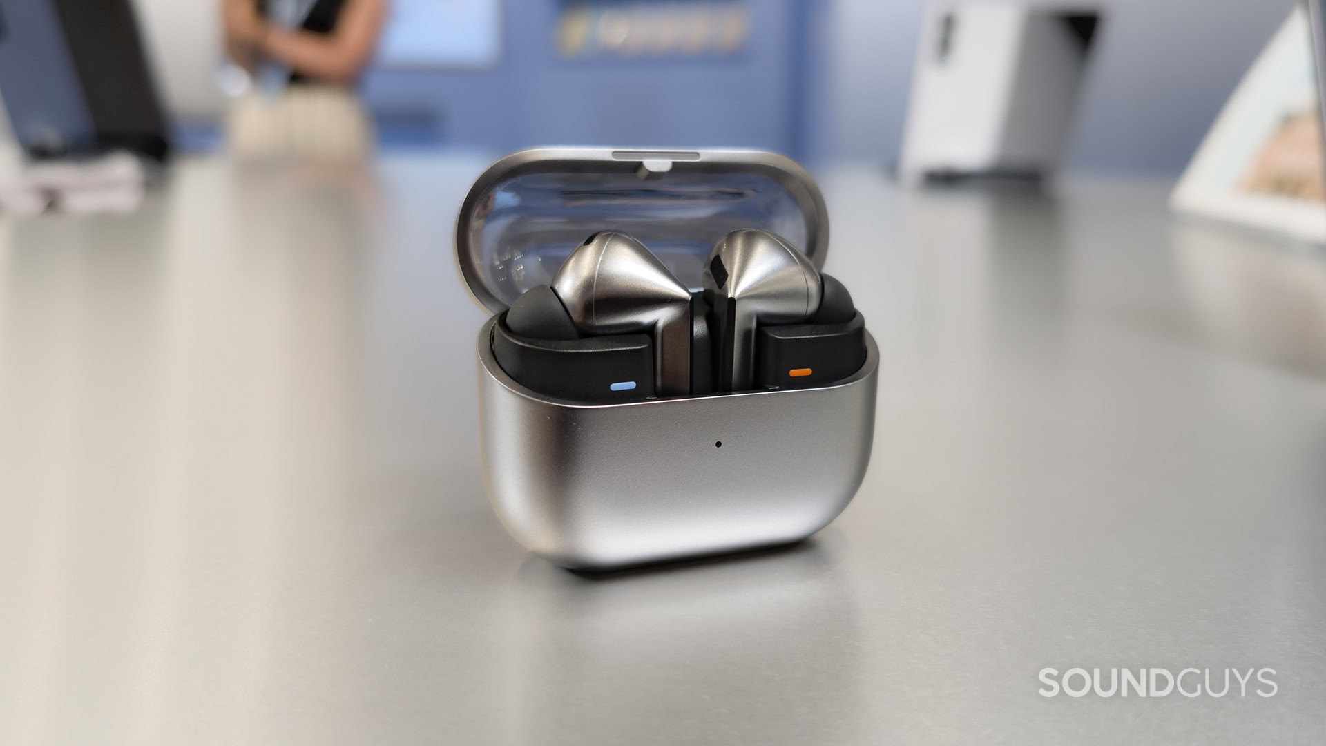 Samsung Galaxy Buds 3 Pro Case Open on Table with Earbuds Inside The Samsung Galaxy Buds 3 Pro inside their case.