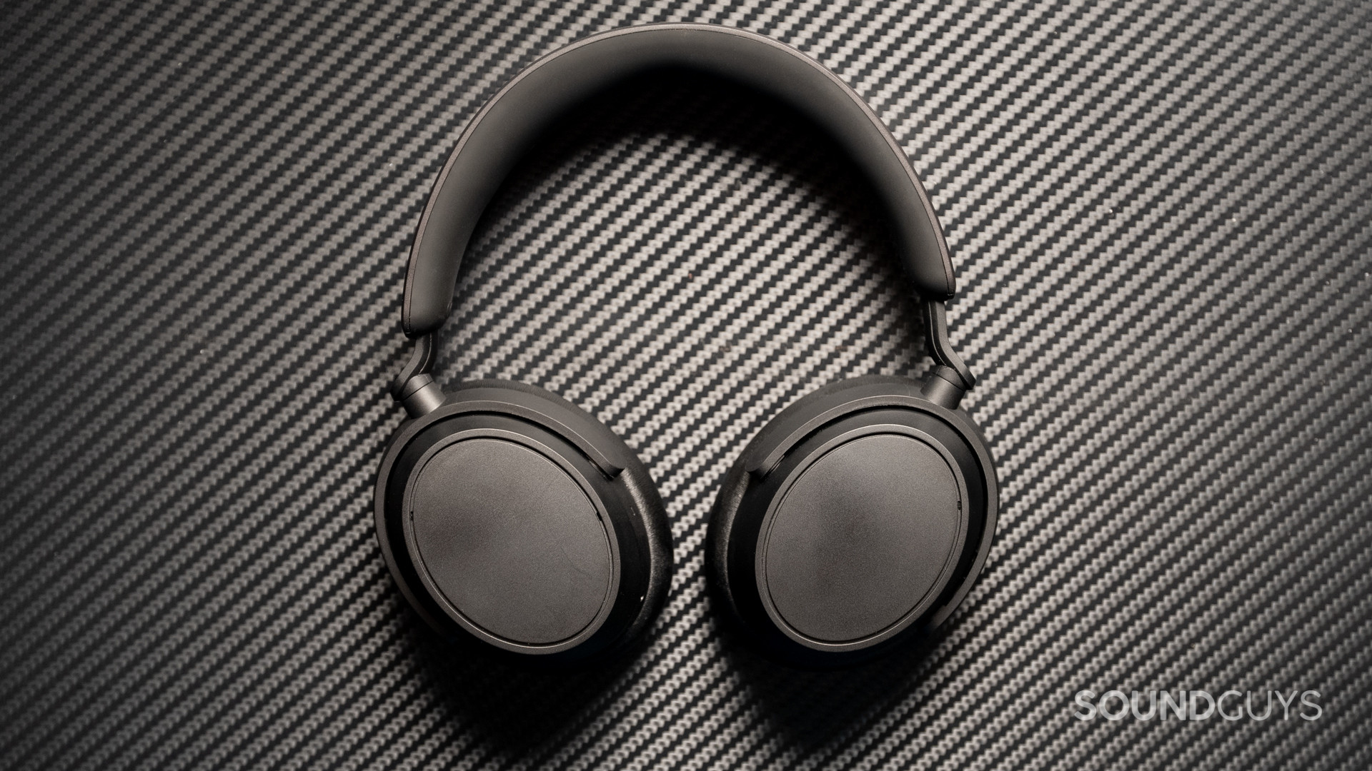 sennheiser-accentum-plus-hero A photo of the Sennheiser ACCENTUM Plus sitting atop a carbon fiber surface.