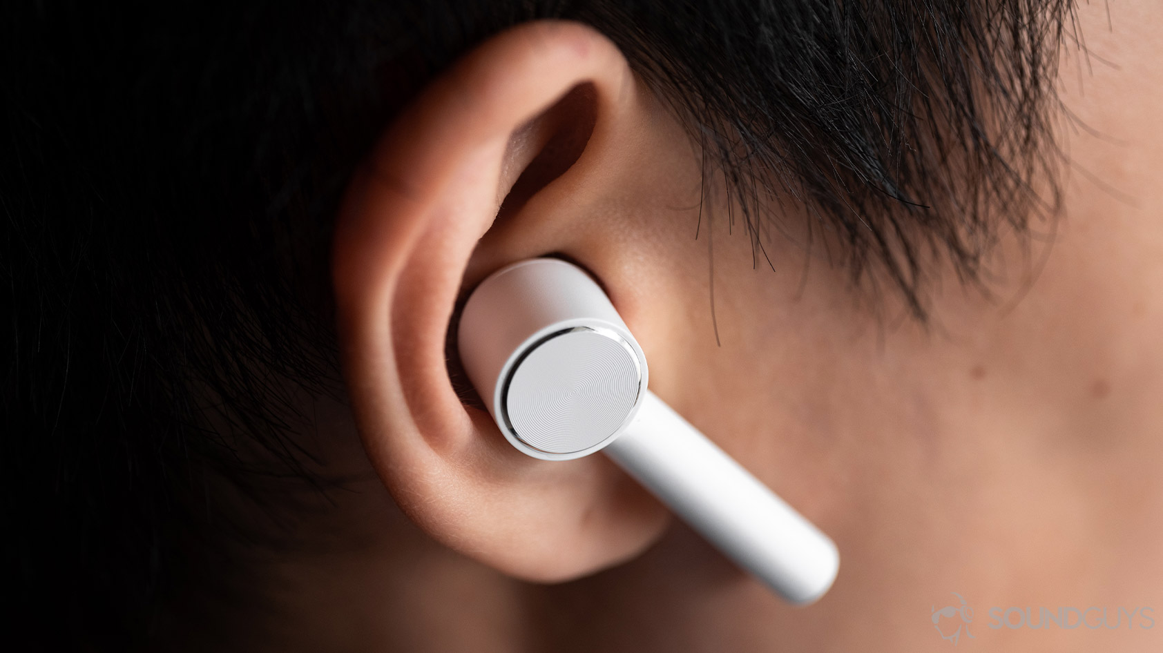 Xiaomi Mi True Wireless-5_earbud worn ear Right Xiaomi Mi True Wireless earbud in an ear.